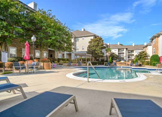 the preserve at ballantyne commons pool with apartment buildings