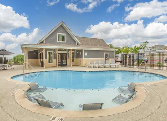 Pool and float deck at Sendero Ridge Apartments Kerrville