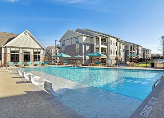 the preserve at ballantyne commons pool and apartment buildings