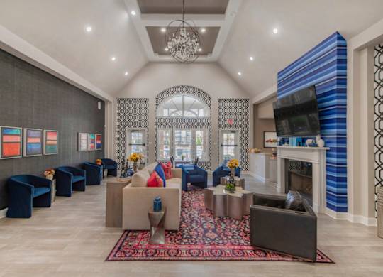 A living room with a fireplace and a television.