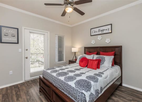 Model Primary Bedroom with Faux-wood flooring