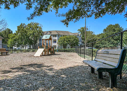 a playground at the whispering winds apartments in pearland, tx