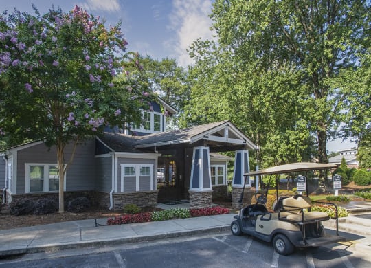 a golf cart parked in front of the leasing center at Wynnwood Vinings