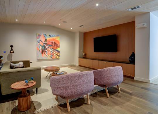 Clubhouse Living Room with pink chairs at Agave, San Antonio, TX, 78205