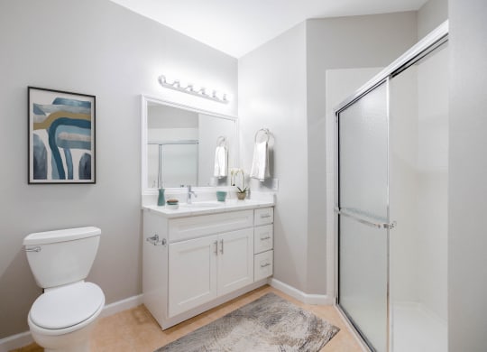 a bathroom with a toilet sink and a shower at The Lena, Raritan, NJ 08869