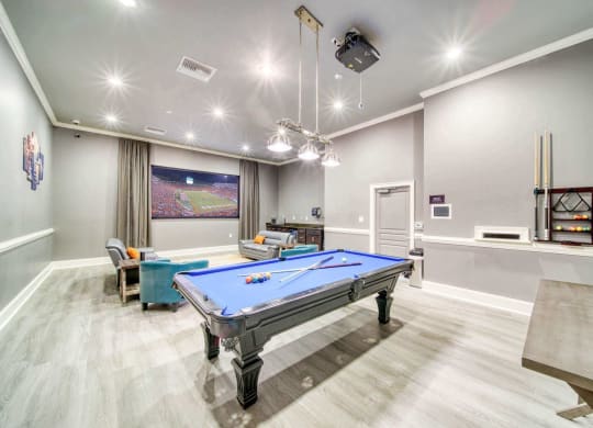a games room with a pool table and HD projector at Meridian Obici, Suffolk, 23434