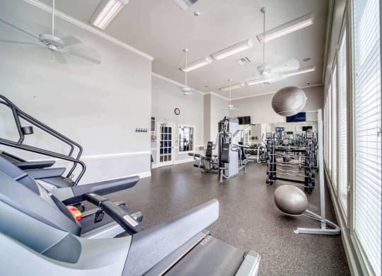 a large fitness room with treadmills and other exercise equipment at Meridian Obici, Suffolk Virginia