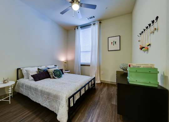 Bedroom with Bed and ceiling fan at Agave, San Antonio, Texas