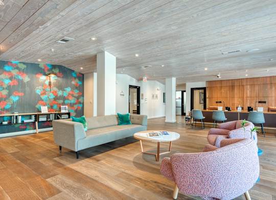 Clubhouse Living Room with chairs at Agave, San Antonio, TX