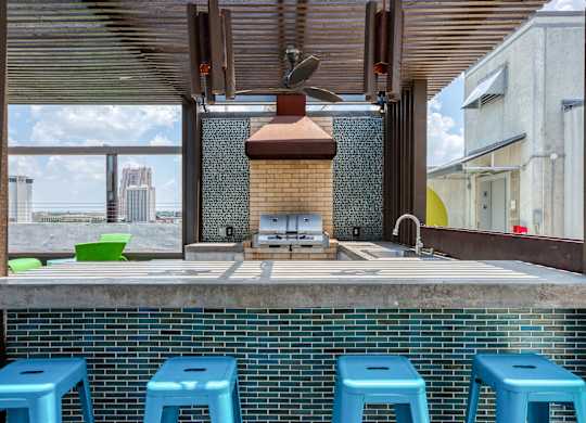 Kitchen with blue stools at Agave, San Antonio, 78205