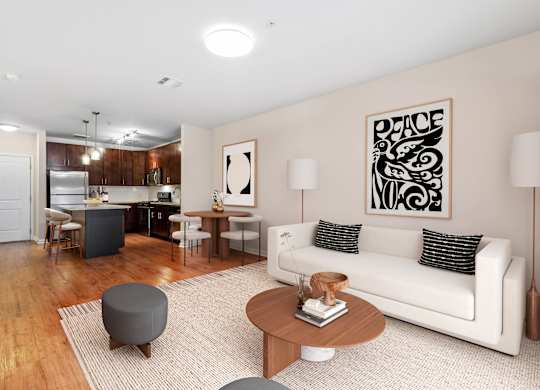 A living room with a white couch and a coffee table  at Metro 303, Hempstead, NY, 11550