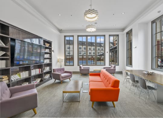 a view of the library with furniture and a large window at Harbor Pointe, Bayonne, 07002