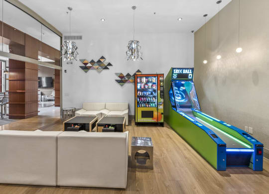 a games room with a foosball table and mini bowling at Harbor Pointe, Bayonne