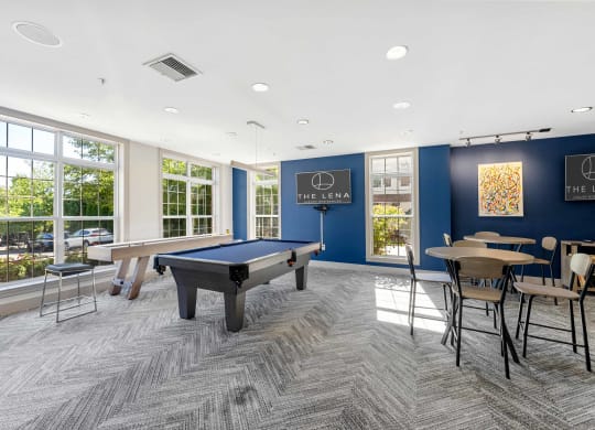 The Clubhouse with a pool and foosball table at The Lena in Raritan, NJ