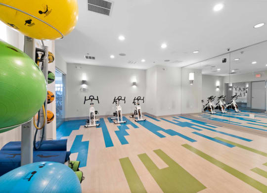a spacious fitness center and yoga studio at The Lena, New Jersey