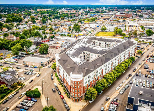 an aerial view of a large brick building with a black roof at Metro 303, New York