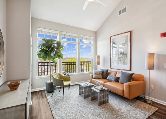 Living room with sofa and lamp at Metro 303, Hempstead, NY 11550
