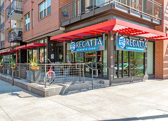 A red and white sign at Regatta Sloans Lake Apartments, Denver
