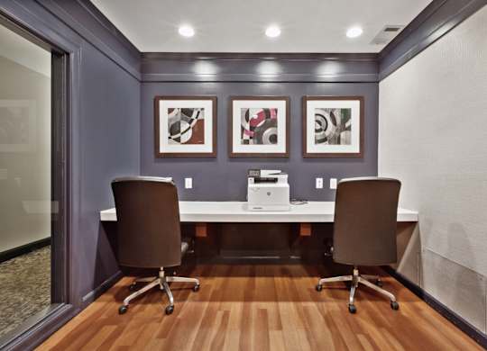 Working area with a printer at West 130, New York , 11552