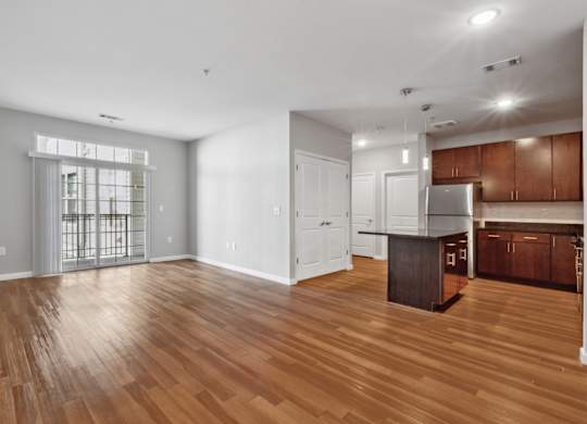 Luxury Vinyl Plank Flooring In Kitchen And Living Room at West 130, West Hempstead, NY, New York 