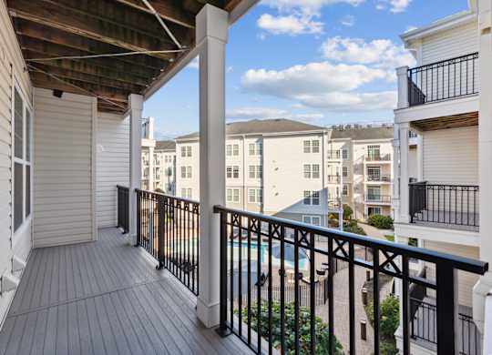 Balcony with view of the swimming pool at West 130, West Hempstead, New York 