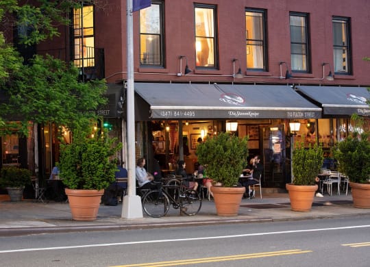 a street view of a restaurant on a city street at The Paxton, Brooklyn, NY 11201