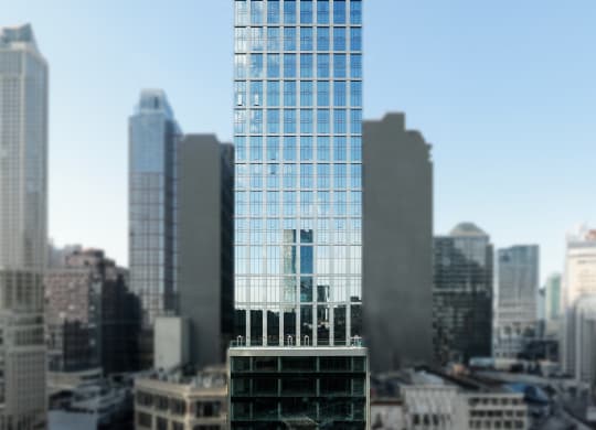 a tall skyscraper in a city with tall buildings at The Paxton, Brooklyn, NY