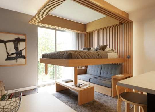 A modern bedroom with a canopy bed and a painting on the wall.