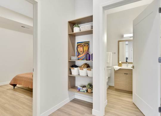 A bathroom with a towel on the floor.