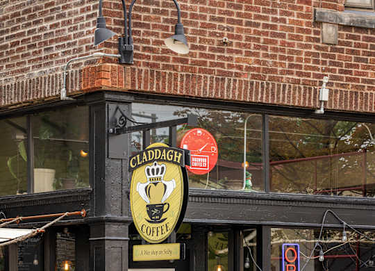 Claddagh Coffee Shop with a sign that says