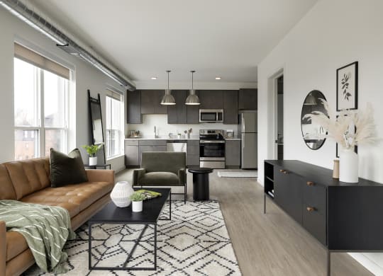 a living room and kitchen in a 555 waverly unit