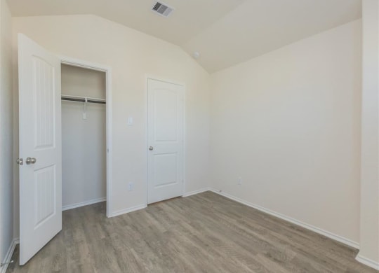 our apartments offer a bedroom with a king sized bed at The Village at Granger Pines, Conroe