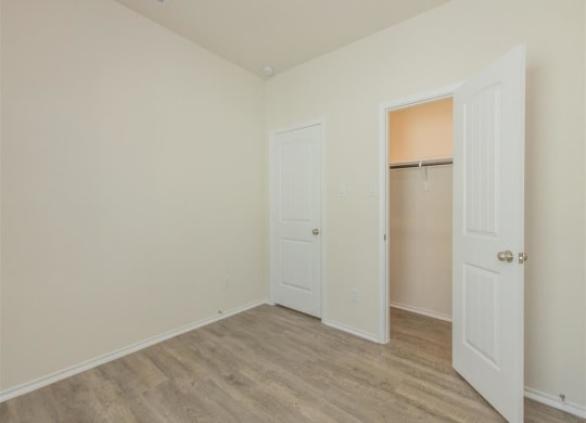 our apartments offer a bedroom with a king sized bed at The Village at Granger Pines, Conroe Texas