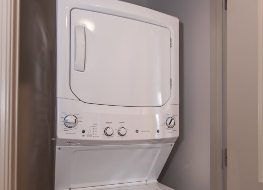 a washer and dryer in the laundry room at The Whitworth, Williamsburg, 23185
