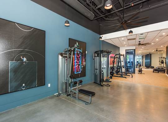 the gym at the flats at big tex apartments
