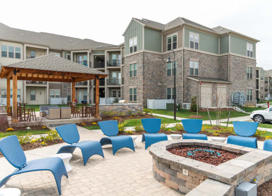 our apartments showcase a fire pit at The Whitworth, Williamsburg, 23185