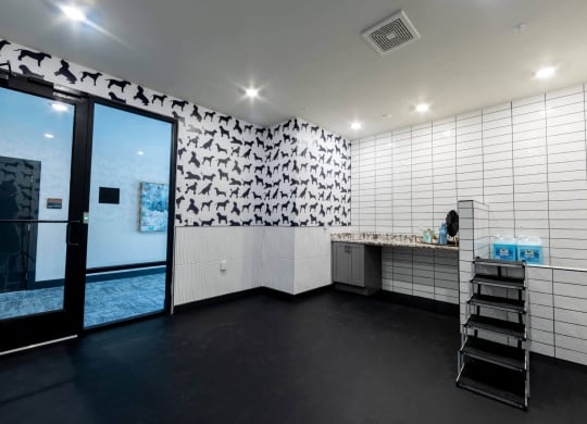 a room with white walls and black flooring at Tapestry West, Virginia