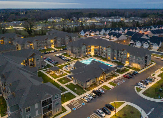an aerial view of a large apartment complex with a swimming pool at The Whitworth, Virginia, 23185
