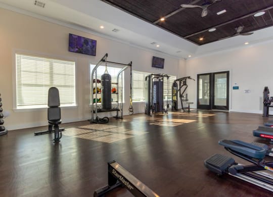 the home gym has plenty of equipment and space for workouts
