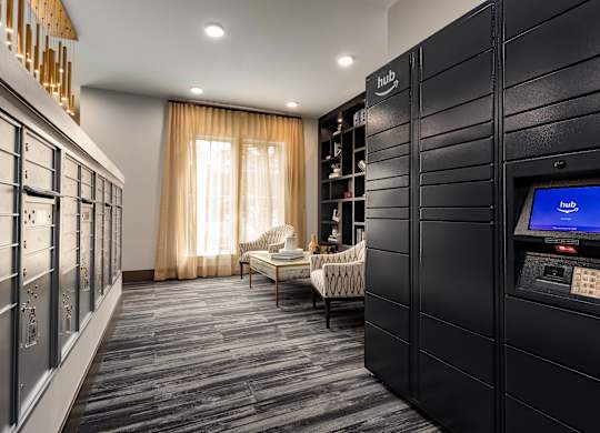 A room with a sofa and a bookshelf with a sign that says