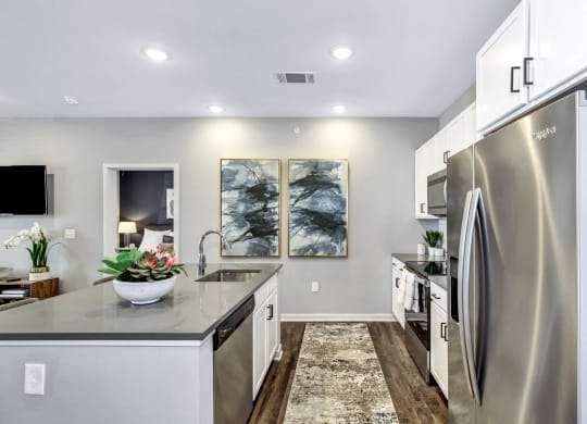 Dining table chair with tv at Farmhaus Apartments, Madison, AL