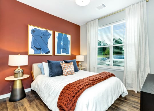 Cozy bed at Farmhaus Apartments, Madison, 35757