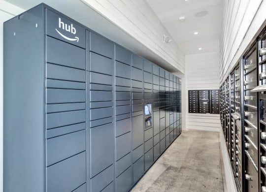 a row of blue lockers in a room with wine racks at Farmhaus Apartments, Madison, AL, 35757