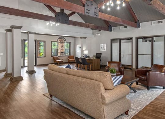 a large living room with a couch and chairs at High Ridge Apartments, Athens, GA 30606
