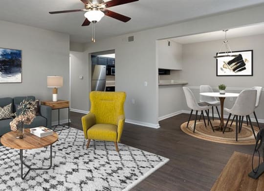 a living room with a couch and a table at High Ridge Apartments, Athens, GA