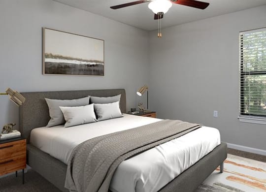 a bedroom with a bed and a ceiling fan at High Ridge Apartments, Athens
