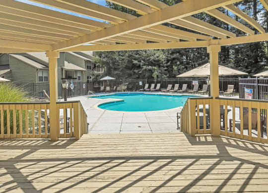take a dip in the pool under the pergola at Hunters Chase Apartments, Midlothian, VA, 23112