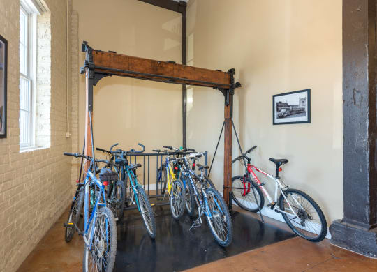 a group of bikes parked in a room at Mayton Transfer Lofts, Petersburg, VA 23803