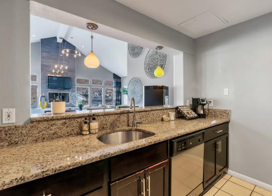a kitchen with granite countertops and a large window at Misty Ridge Apartments, Virginia, 22191