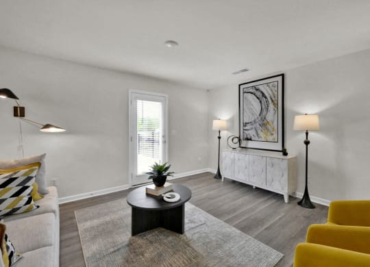 Living room area with couch and table at Valley Ridge, Rossville, GA